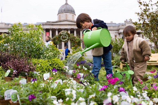 children-watering-plants