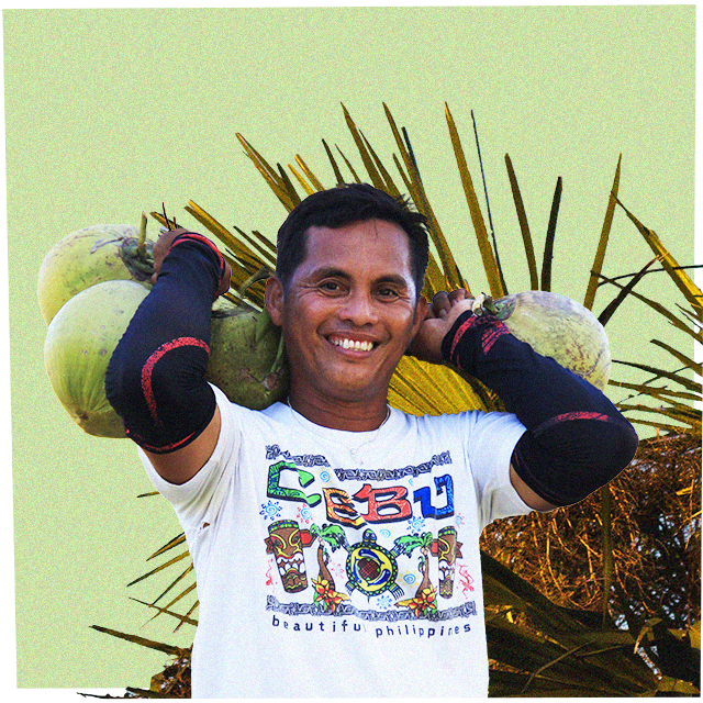 man-carrying-coconuts