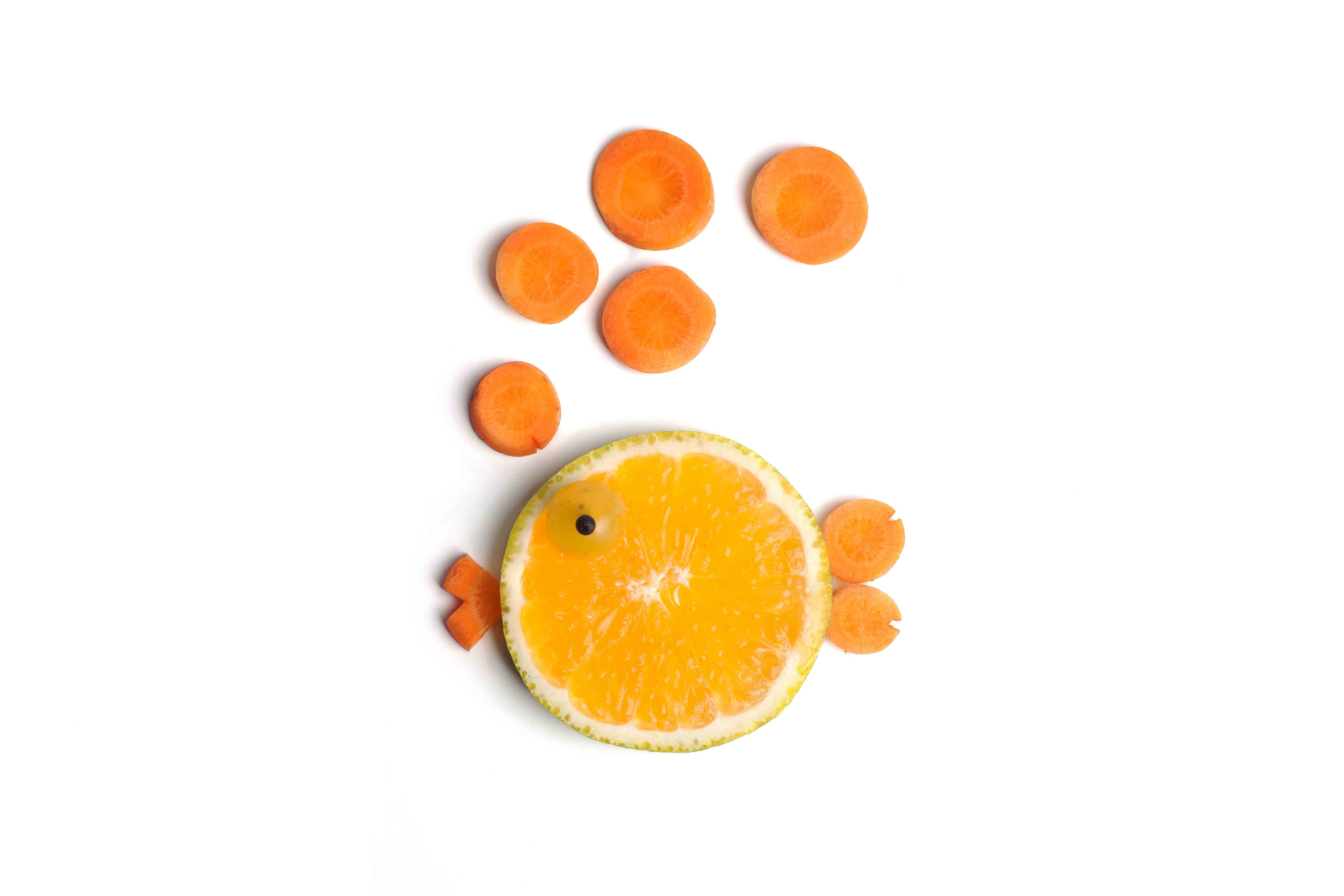 half an orange and carrots