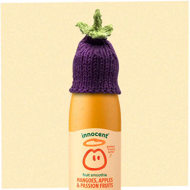 Here's a smoothie bottle with a aubergine hat on it. 